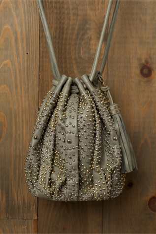 Nevaeh Studded Bucket Bag at Free People Clothing Boutique from freepeople.com
